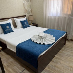 "King-size" o'lchamdagi to'shakli xona