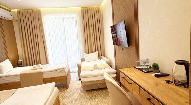 Deluxe Triple Room