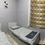 Ikkita alohida to'shakli ikki kishilik standart xona